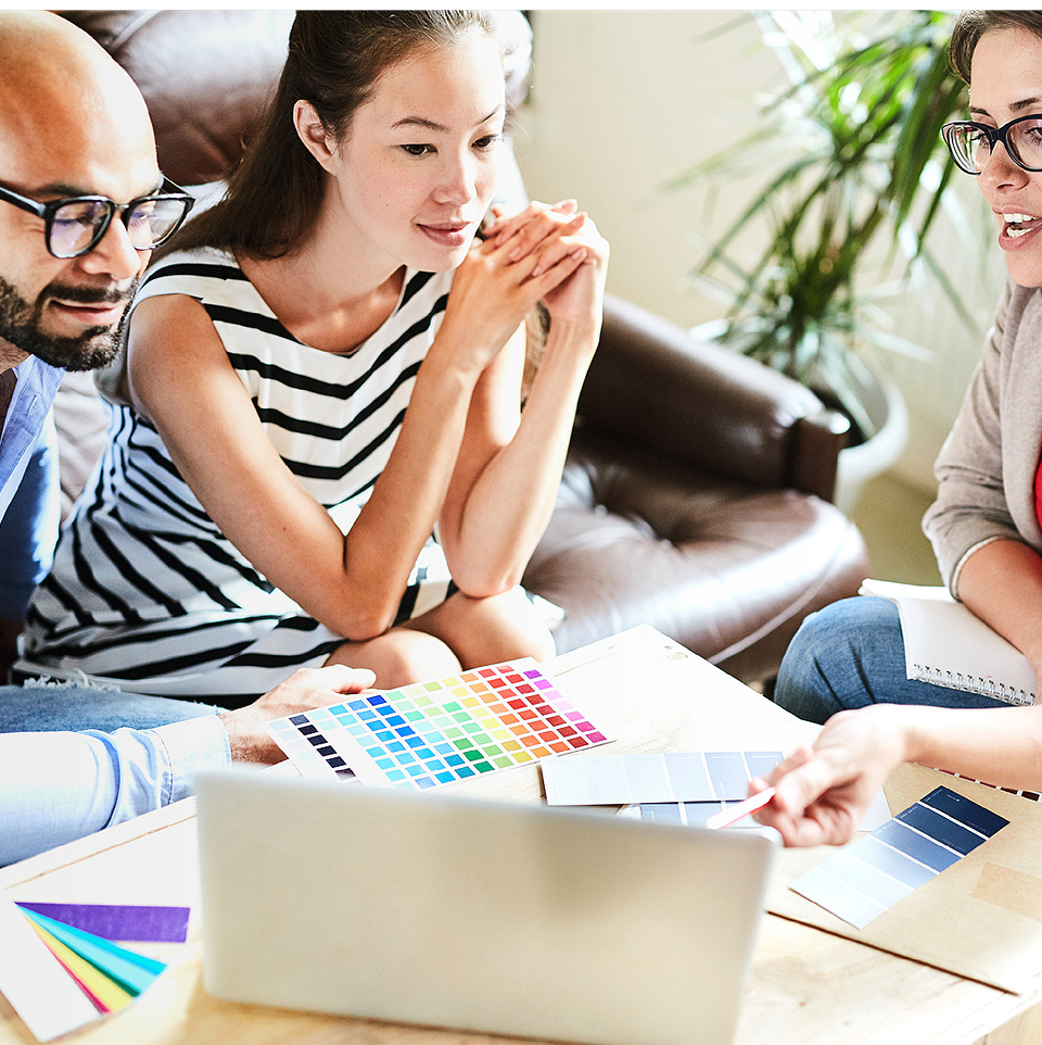 Creative team collaborating over design concepts