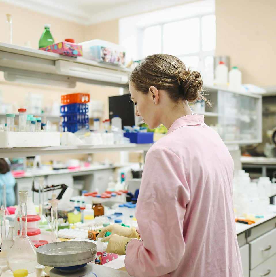 Scientist conducting laboratory tests on food sample